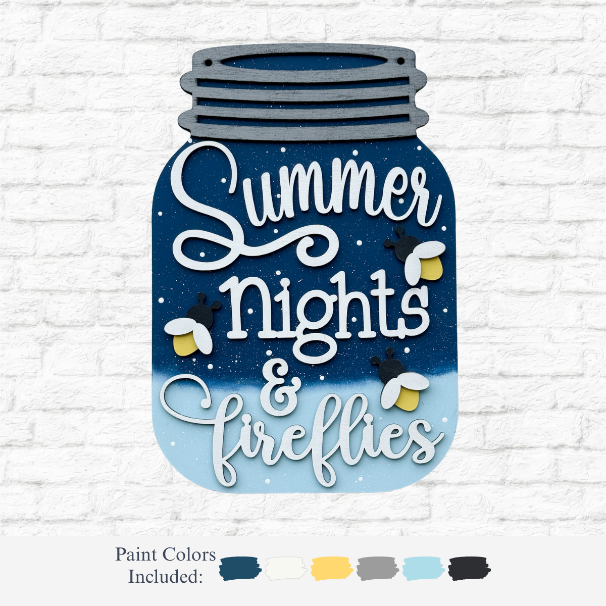 The Rustic Rhode DIY Firefly Mason Jar Door Hanger features Summer nights & fireflies in white script on a blue ombre mason jar shape with firefly accents, plus a palette of six paint colors for your own creative touch.