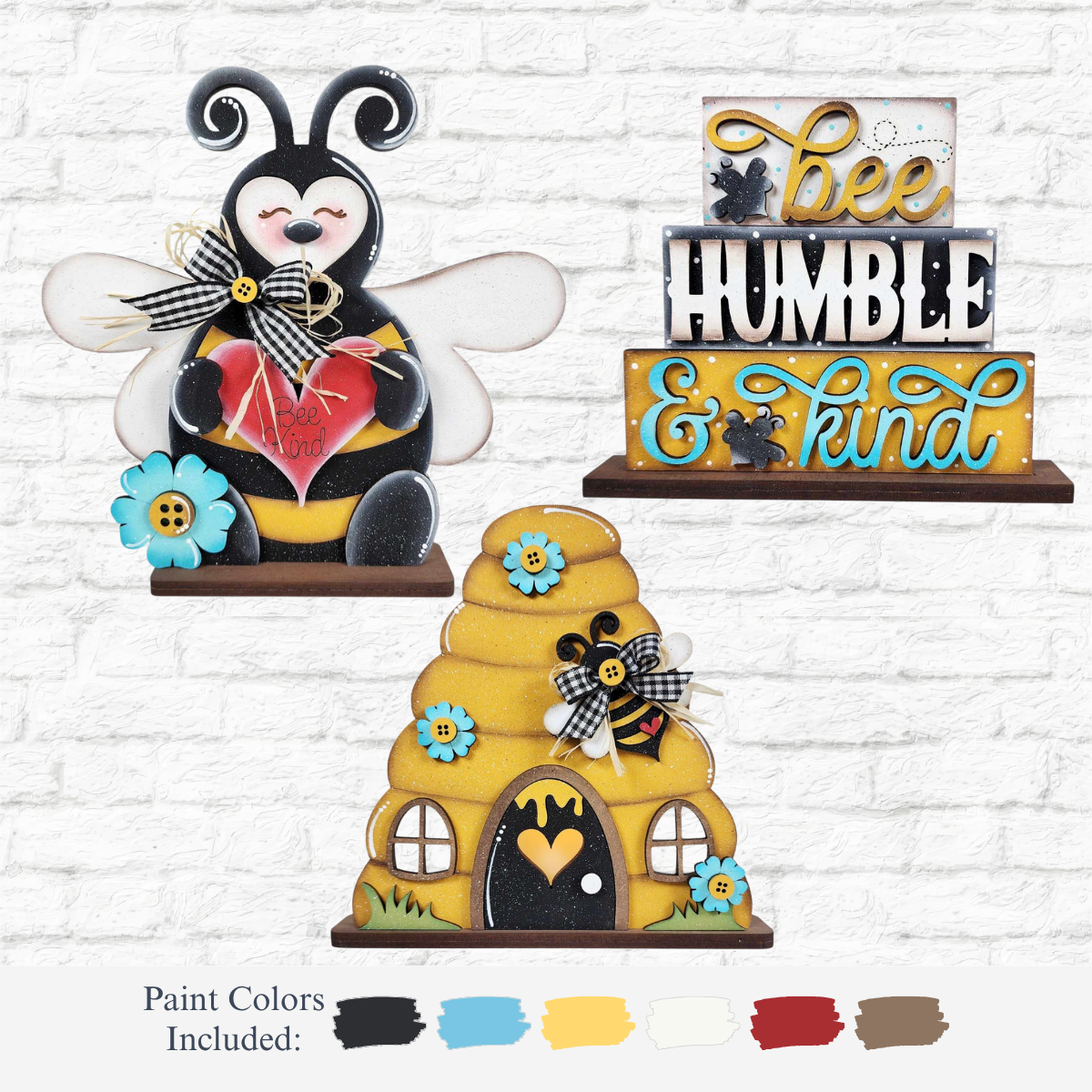The Rustic Rhode’s DIY Honey Bee Shelf Sitter- Set of 3 features wooden bee-themed crafts and six paint colors—black, white, blue, yellow, brown, and cream—making it perfect for handmade bee decor.