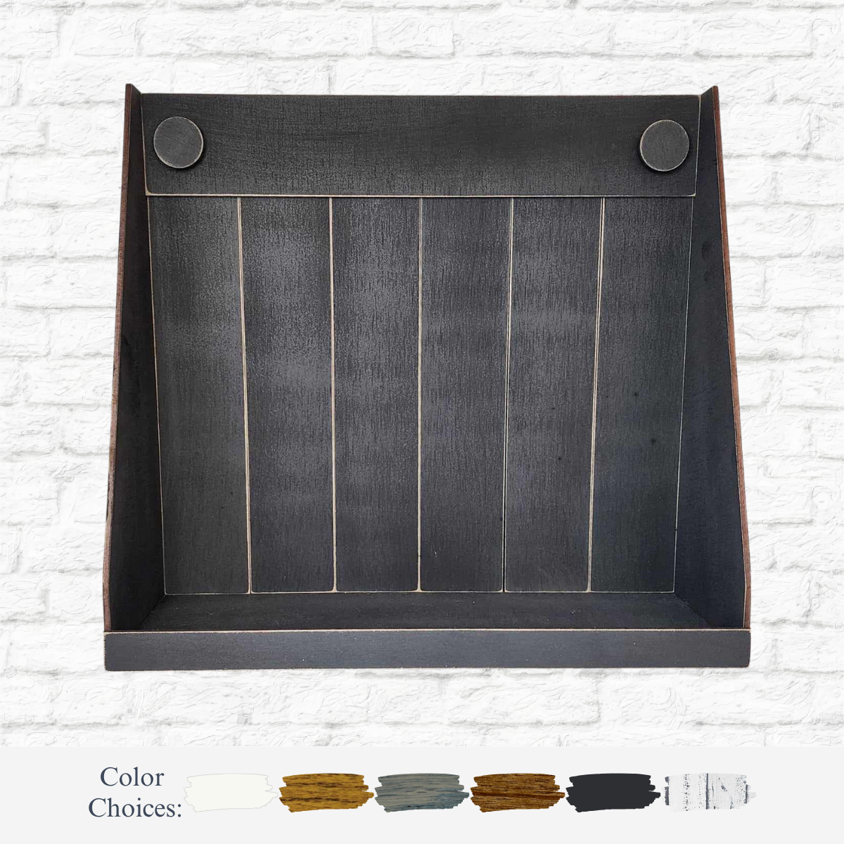 A black, rustic Baltic Birch shelf by The Rustic Rhode is displayed against a white brick wall. Five color choices—white, mustard, green, brown, and black—are shown below. Perfect for your DIY Shaker Box Shelf project.