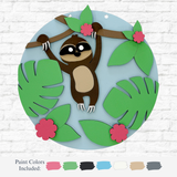 The Rustic Rhode’s DIY Sloth Kids Kit features round wall art with a cartoon sloth, green leaves, and pink flowers. Includes six paint colors—perfect creative fun for kids in Warwick, RI.