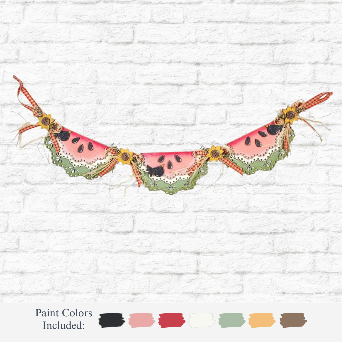 The Rustic Rhode’s DIY Watermelon Banner features painted watermelon slices and sunflowers on red gingham ribbon, displayed on a white brick wall. Paint colors: black, red, pink, cream, green, and yellow—perfect for summer décor.