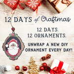 A festive flat lay with gifts, ornaments, pine cones, and Santa on wood. Text: 12 Days of Craftmas by The Rustic Rhode—open 12 days of DIY ornament craft boxes for a creative Christmas!.