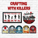 A display of The Rustic Rhode’s Crafting With Killers Workshop signs featuring horror killer silhouettes, clever text, and blood effects, set against a white brick wall. The red title reads Crafting With Killers Workshop.