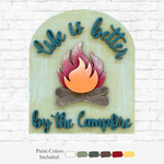 The Rustic Rhode DIY Campfire Arch Insert is a decorative sign with life is better by the campfire, featuring a painted campfire on laser-cut Baltic Birch. Includes light green, cream, dark green, gray, red, and brown paint colors.