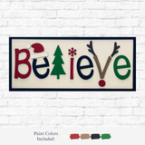 The Rustic Rhode’s DIY Believe in Christmas kit features a festive sign with a Santa hat on the “B,” tree for the “L,” snowflake on the “i,” and antlers plus red nose on the “V.” Comes with four paint colors for your holiday craft.