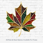 The Rustic Rhode’s DIY Crisp Leaves Faux Suncatcher kit features a maple leaf in red, green, yellow, and brown with gold outlines—perfect for making your own ornament. All paint & stain options are available for the frame.