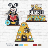 The Rustic Rhode’s DIY Honey Bee Shelf Sitter- Set of 3 features wooden bee-themed crafts and six paint colors—black, white, blue, yellow, brown, and cream—making it perfect for handmade bee decor.