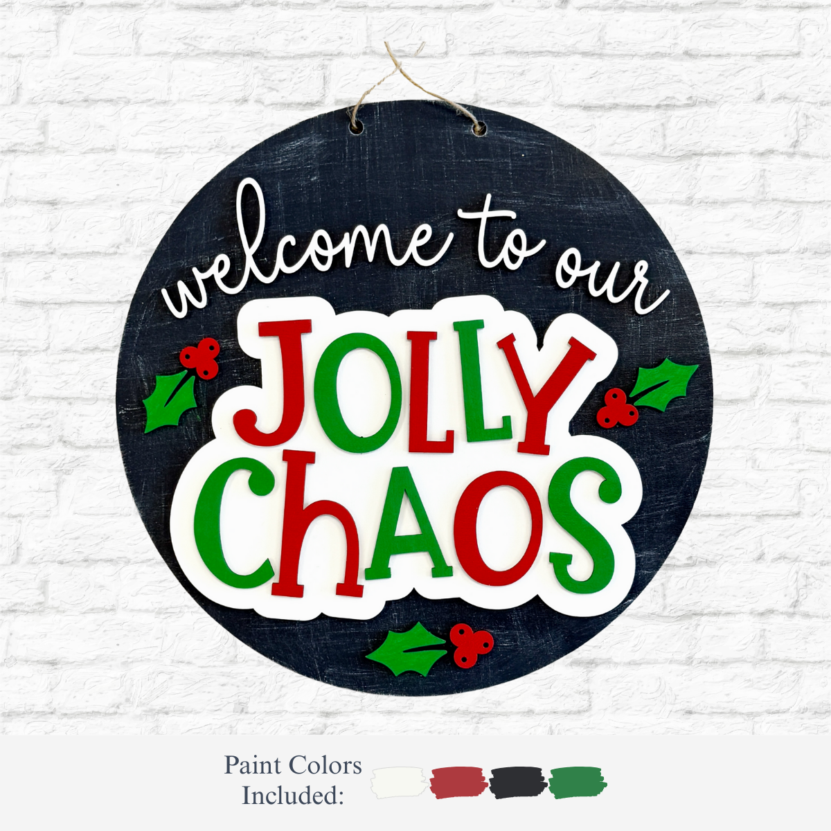 The Rustic Rhode DIY Jolly Chaos Door Hanger features “welcome to our JOLLY CHAOS” in festive red, green, and white with holly accents. Hung on a white brick wall, it’s perfect for your Warwick RI studio—paint colors included!.