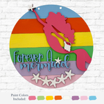 The DIY Mermaid Kids Kit by therusticrhode features a round wooden sign with a rainbow-striped background, pink mermaid silhouette, white starfish, and “Forever a mermaid” in blue and lavender—perfect for fun mermaid crafts! Paint color samples below.