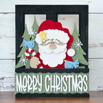 The Rustic Rhode’s DIY Merry Christmas 2 Piece Insert features a cartoon Santa with a candy cane, green trees, blue birds, and “Merry Christmas”—ideal handmade décor for your Interchangeable Window Frame.