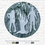 The Rustic Rhode’s DIY Paint Pour- Zombies features spooky zombie silhouettes and a raised hand in light gray on a marbled green, white, and gray circular canvas, with paint swatches shown below against a brick wall.