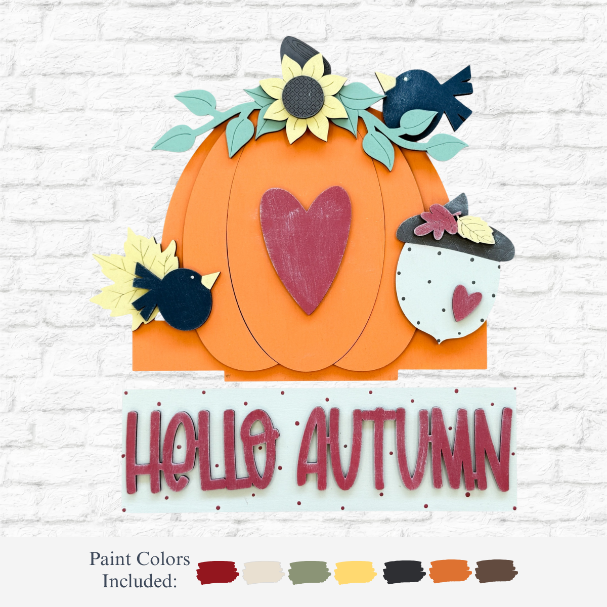 The Rustic Rhode DIY Pumpkin Season 2 Piece Insert features autumn decor: an orange pumpkin with a red heart, sunflower, black birds, white pumpkin with floral hat, and Hello Autumn sign for your interchangeable window frame. Paint samples included.
