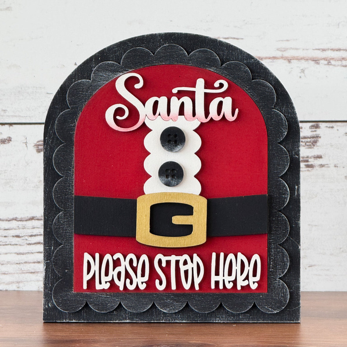 Add handmade classroom decor charm with The Rustic Rhode’s DIY Teachers Apple Arch Insert, featuring a charming apple design—perfect for displays on wooden surfaces against white walls.