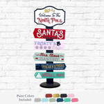 The Rustic Rhode DIY Santa's Workshop Directional Signpost features six festive arrows, including “Welcome to the North Pole” and “Santa’s Workshop”—a perfect holiday décor piece! Paint color swatches shown below.