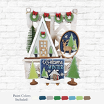 The Rustic Rhode’s DIY Welcome Winter Tiered Tray Set includes winter word art with a white house, trees, wreaths, deer, and Welcome Winter text on a white brick background—perfect for personalized décor or craft kits. Sample paint colors provided.