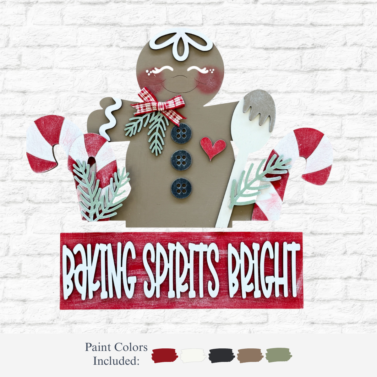 The Rustic Rhode DIY Gingerbread 2 Piece Insert features a gingerbread with red bow, buttons, candy canes, and baking utensils. A red “Baking Spirits Bright” sign appears below, with paint colors displayed at the bottom.