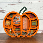 The Rustic Rhode's Tales From The Nook: Falls & Frights is a wooden pumpkin-shaped shelf for your DIY Book Nook, featuring autumn mini signs—Pumpkin Spice & Everything Nice, Hello Fall, Apple Orchard—plus pumpkins and moss at the base.