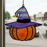 The Rustic Rhodes DIY Pumpkin Witch Faux Suncatcher, shaped like a pumpkin with a purple and green witch hat, adds charming witch-themed window decor to your space.