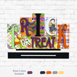The Rustic Rhode DIY Trick or Treat Word Block features playful, patterned letters and Halloween icons like candy corn and a spider. Display against any wall; includes six paint swatches for a custom festive look—perfect for your seasonal décor!.